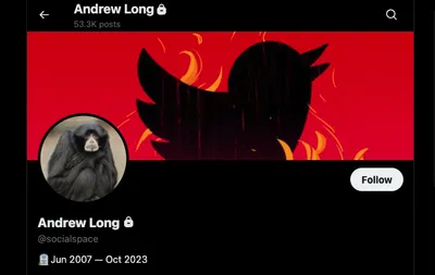 Twitter bird logo in flames.